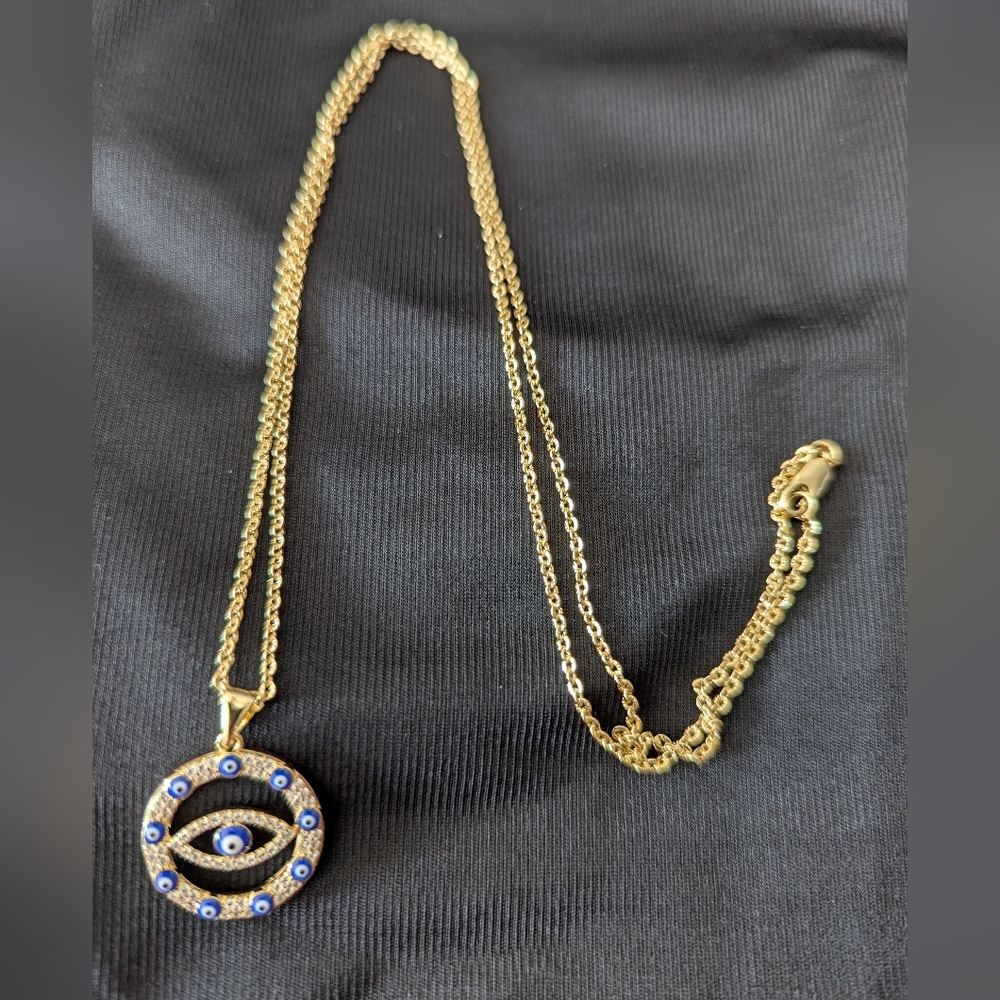 Pretty Bird Gold Necklace with Blue Eye Pendant